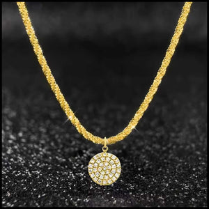 Gold-plated zircon round pendant necklace on delicate chain with sparkling stones