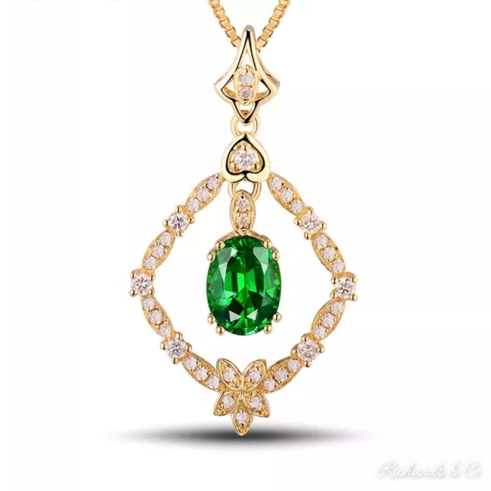 18K yellow gold Diamonds & Tsavorite pendant with oval tsavorite garnet and round natural diamonds
