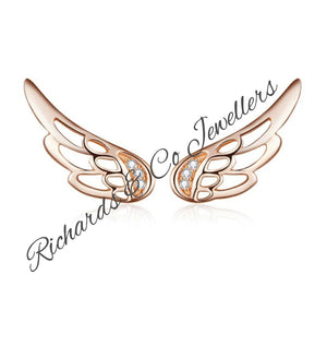 Silver Zircon sterling silver wing earrings with zircon stones and push back closure