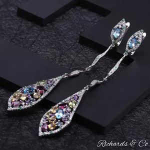 Multi-colour silver long drop earrings with natural gemstones including garnet, peridot, citrine, topaz, amethyst, emerald, and white CZ