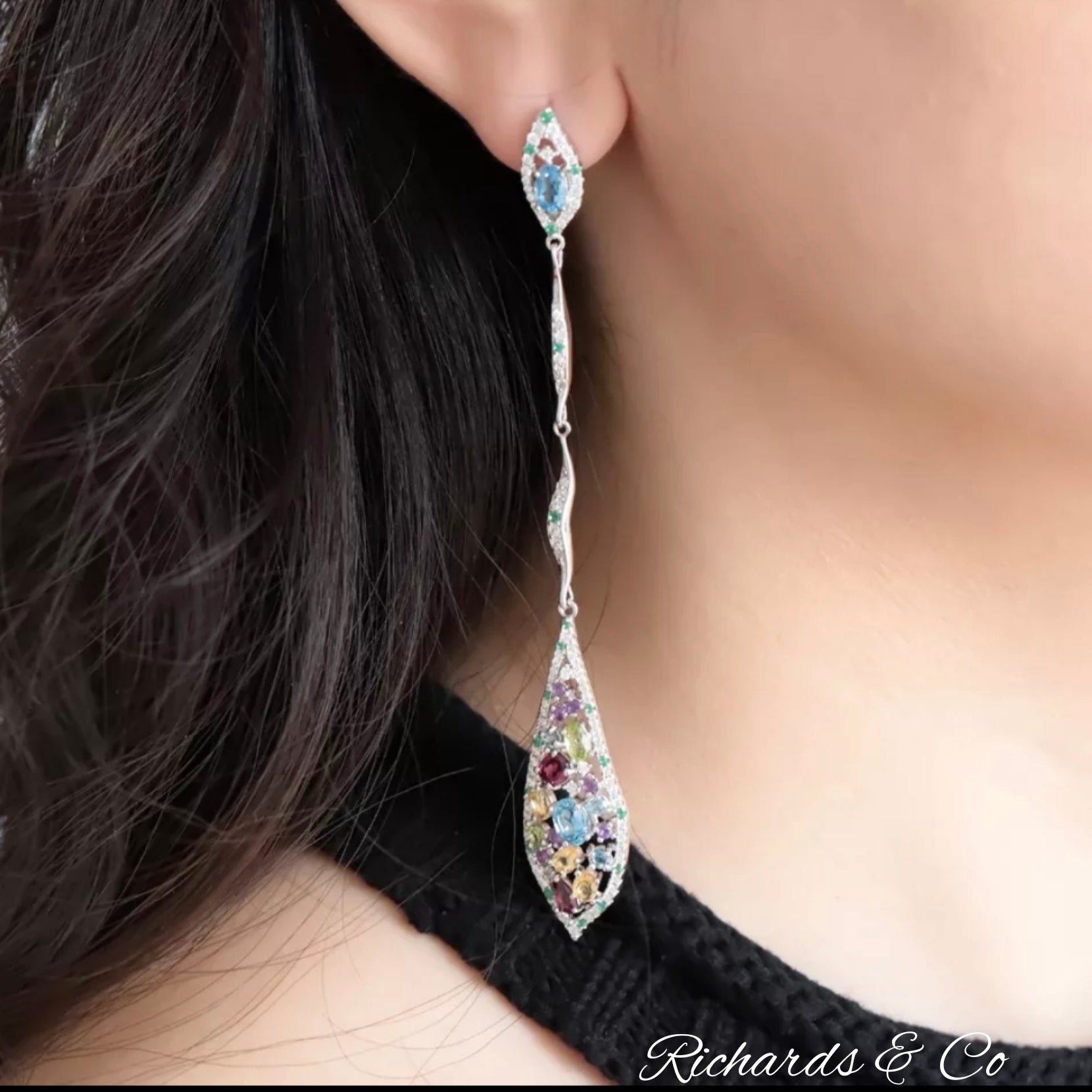Long silver drop earrings with multi-colour natural gemstones including garnet, peridot, citrine, topaz, and amethyst