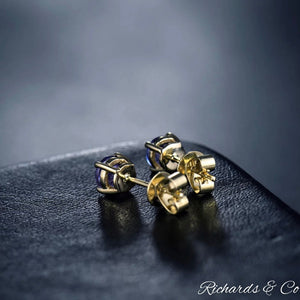 Natural Tanzanite stud earrings in 14K yellow gold with round 5mm violet-blue gemstones