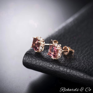 Natural Pink Tourmaline princess cut stud earrings in 18K rose gold with diamond accents