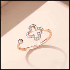 Rose gold plated adjustable four-leaf clover ring with cubic zirconia stones