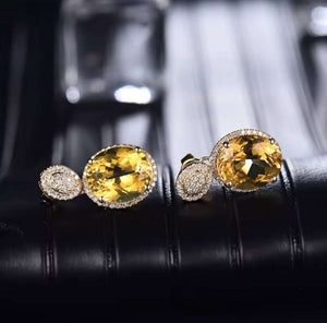 Bailey - Citrine Diamond Drop Earrings in yellow gold, with oval golden citrine stones and pavé diamond accents.