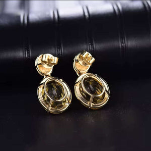 Bailey - Citrine Diamond Drop Earrings in polished yellow gold, with dark oval gemstones in sculptural openwork settings.