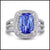 18k white gold ring with cushion-cut blue tanzanite and diamond halo