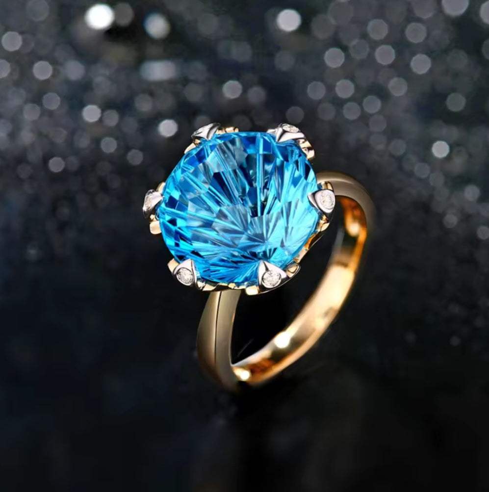R and C Signature Piece ring with 9.68ct blue topaz and diamond accents in 14K white and yellow gold setting