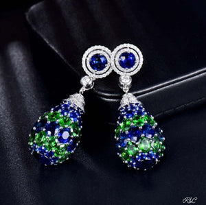 CHRISTINE Diamond Earrings in 18K white gold featuring blue sapphires, green tsavorites, and sparkling diamonds