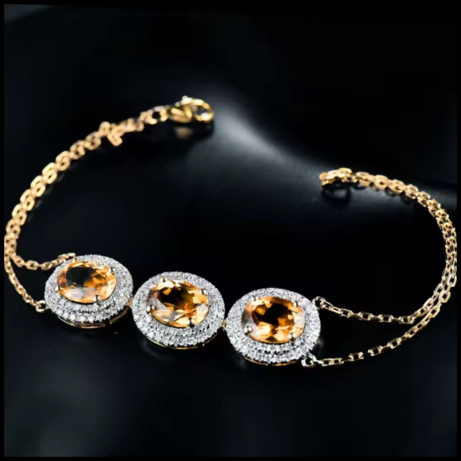 Citrine Diamond Three-Stone Gold Bracelet with oval citrine and diamond halo on double chain
