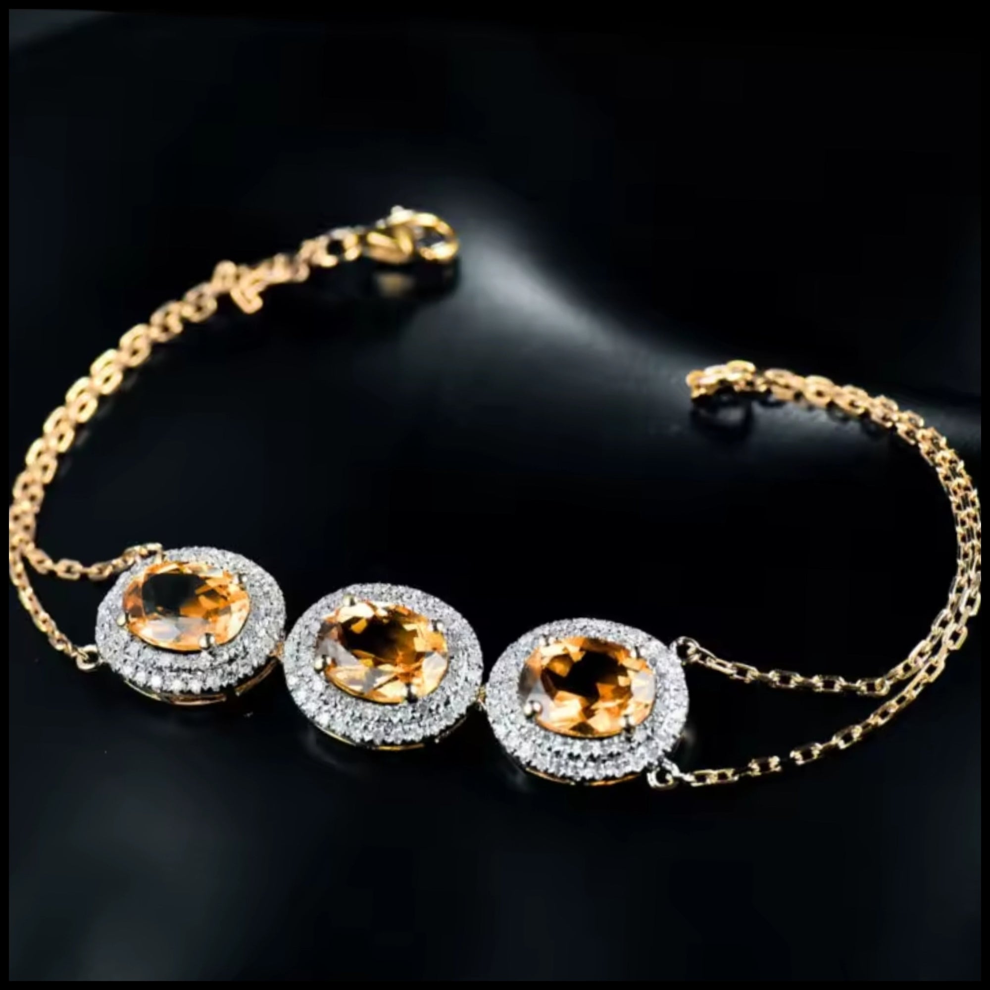 Citrine Diamond Three-Stone Gold Bracelet with oval citrine and diamond halo on double chain