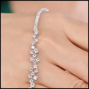 Diamond bracelet on a hand with a blurred background
