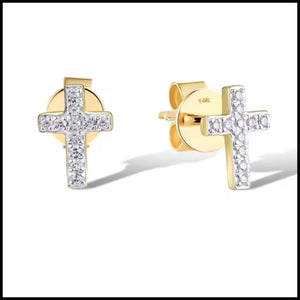 Gold cross-shaped earrings with clear stones on a white background