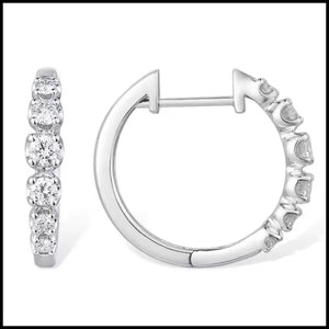 White gold hoop earrings with diamonds on a white background