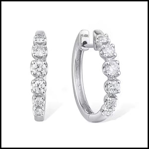 Diamond hoop earrings on a white background