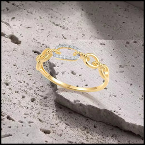 14k yellow gold diamond link chain band ring with 14 natural diamonds totaling 0.04ct on textured stone background