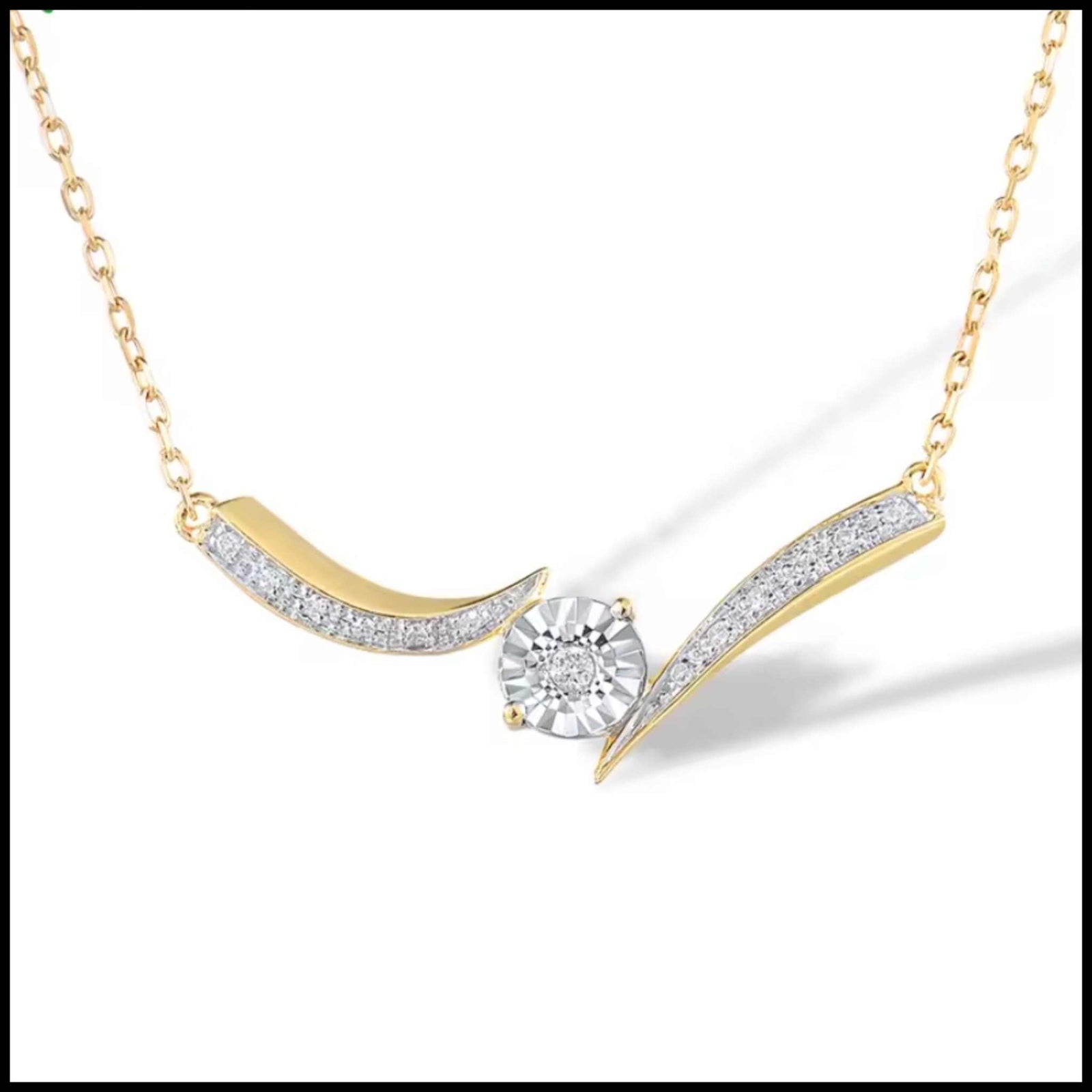 Gold necklace with a diamond pendant on a white background