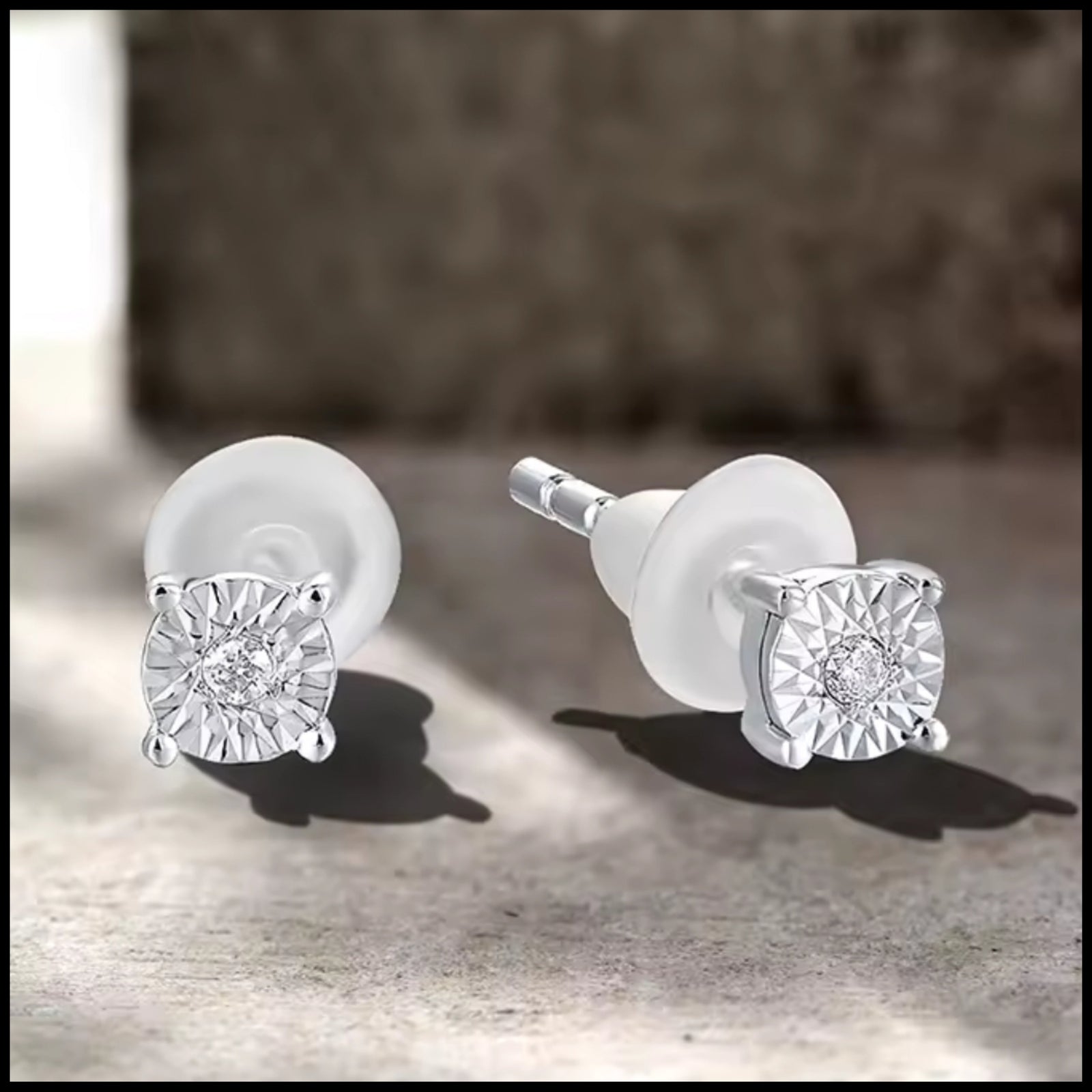 Diamond 9k white gold stud earrings with 0.01ct diamonds, elegant and refined design