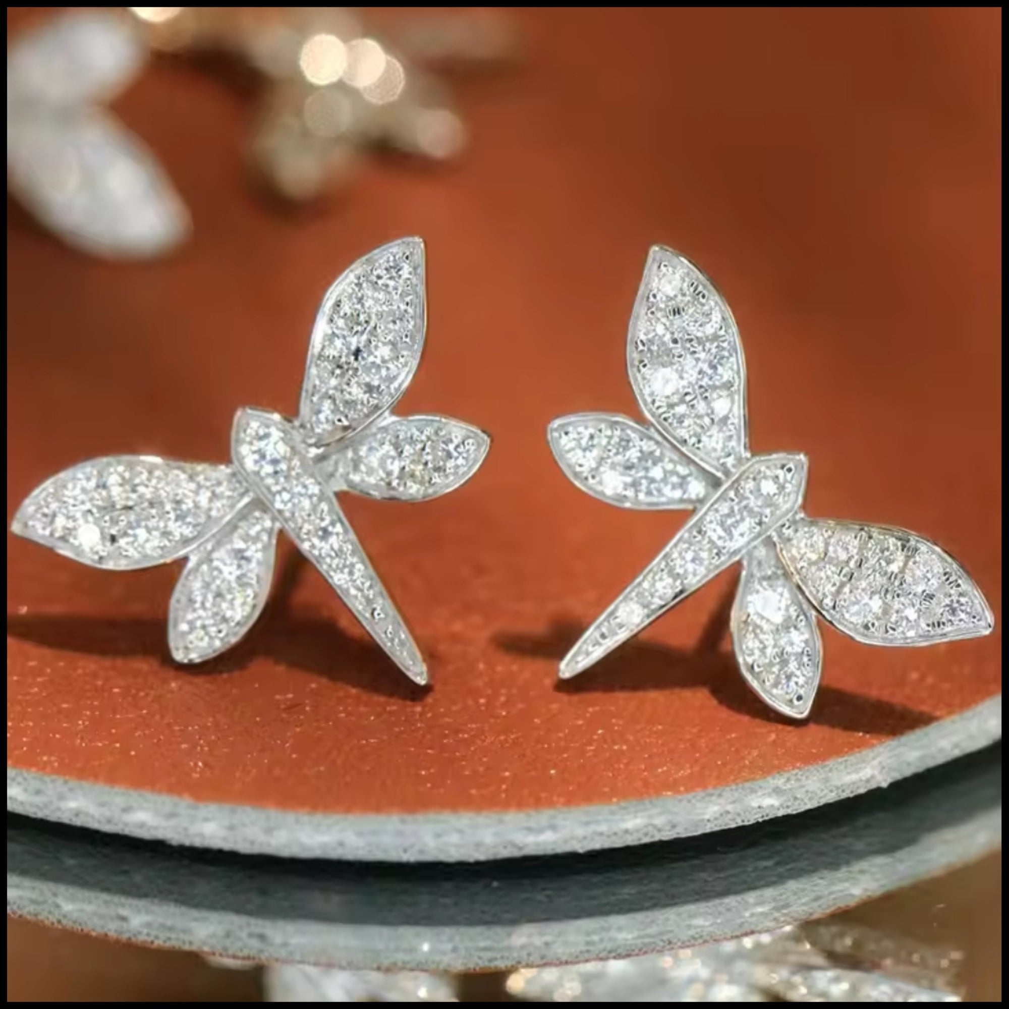 Diamond dragonfly earrings set in 18k white gold with sparkling natural diamonds