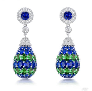 CHRISTINE Diamond Earrings in 18K white gold with blue sapphires, green tsavorites, and diamonds.