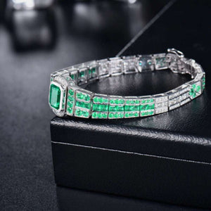 ARABELLA Emerald & Diamond Bracelet in 18K white gold with emerald and princess-cut diamond accents