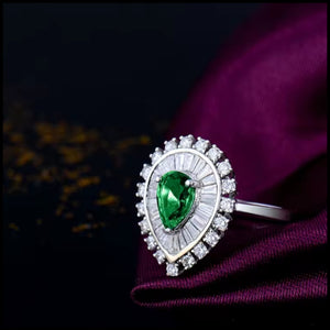 18k white gold emerald and diamond pear-cut ring from Clarity Collection