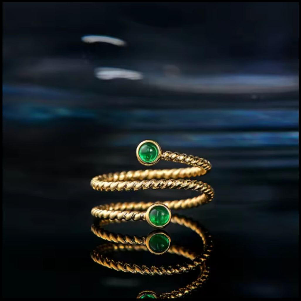 Emerald Bezel Gold Swirl Ring
