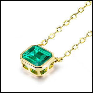 Emerald 18K yellow gold necklace with 1.6 carat emerald pendant on delicate chain