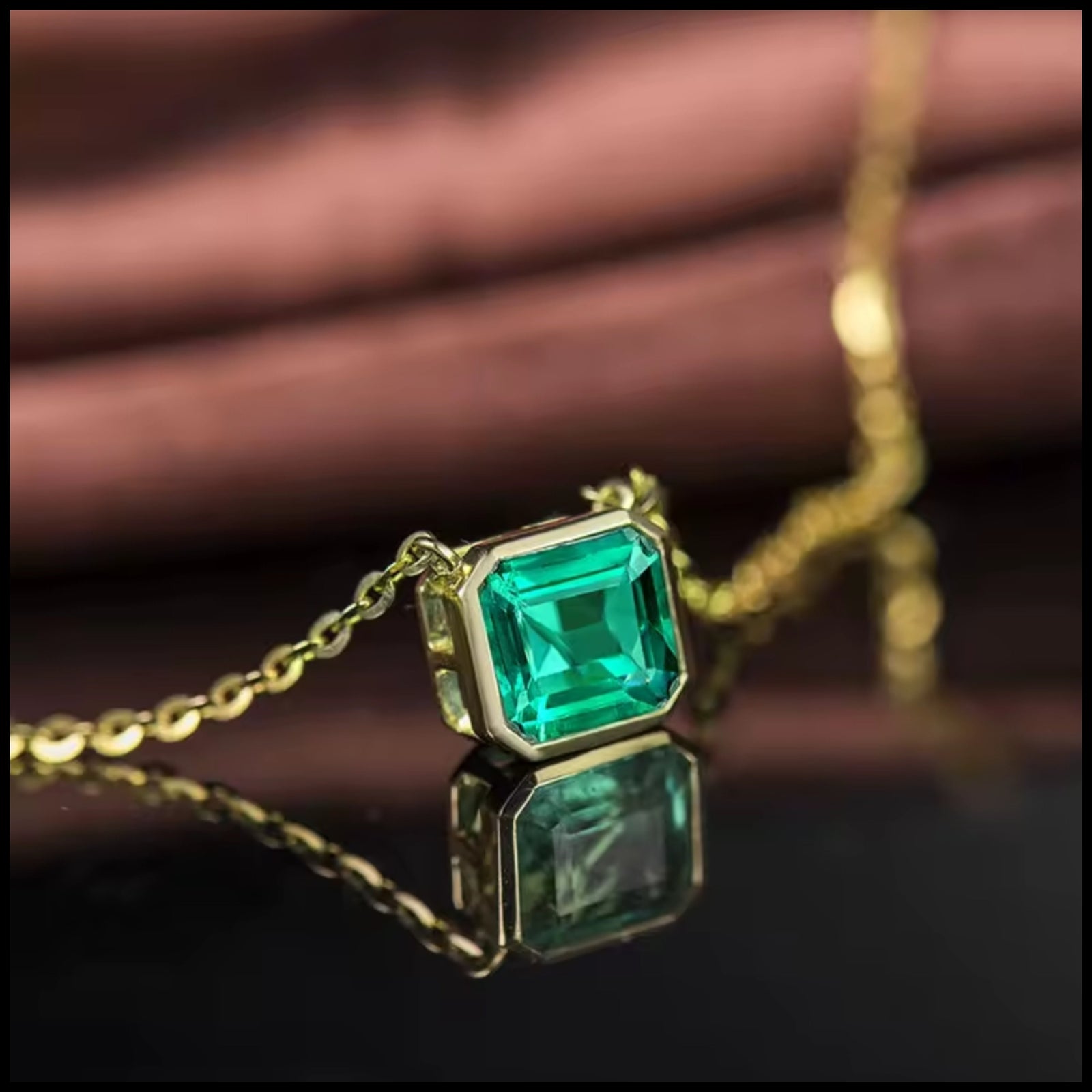 Emerald 18k yellow gold necklace with 1.6-carat emerald cut emerald pendant on delicate chain