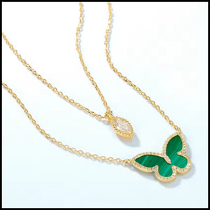 green butterfly pendant necklace with gold chain and malachite stone detailing
