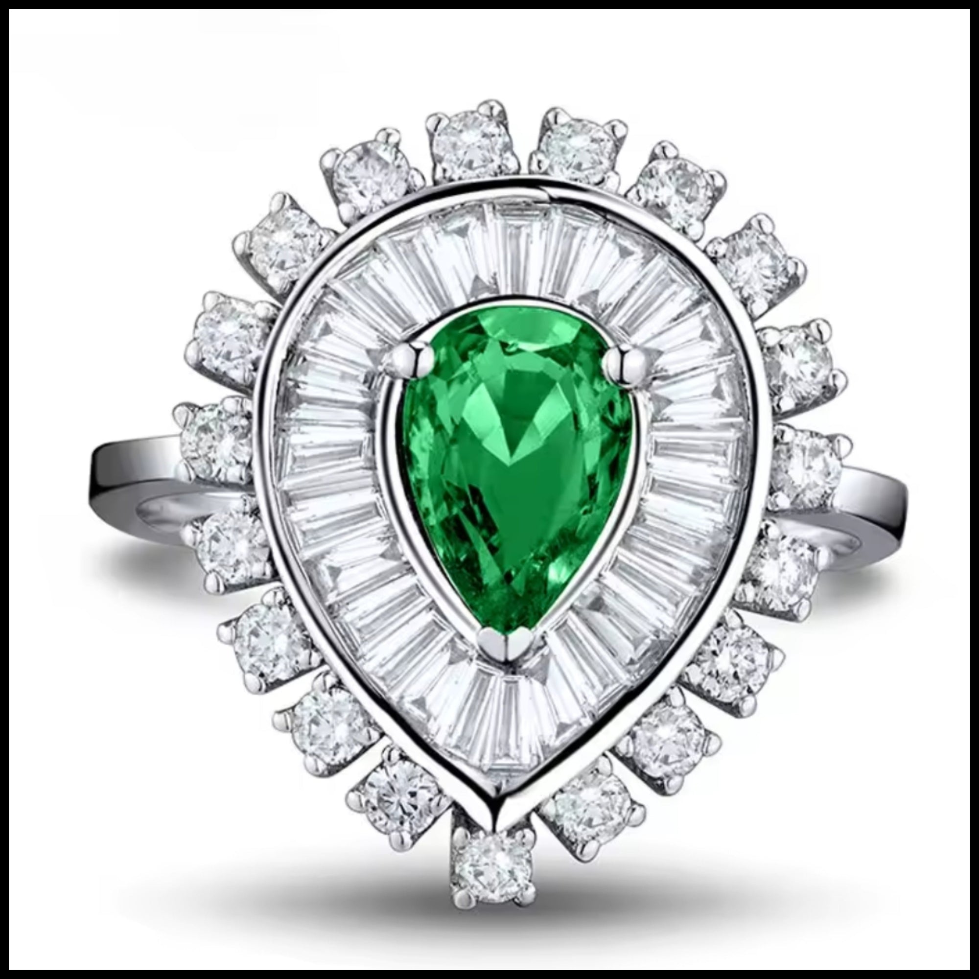 18k white gold emerald and diamond ring with pear-cut emerald and round baguette diamonds