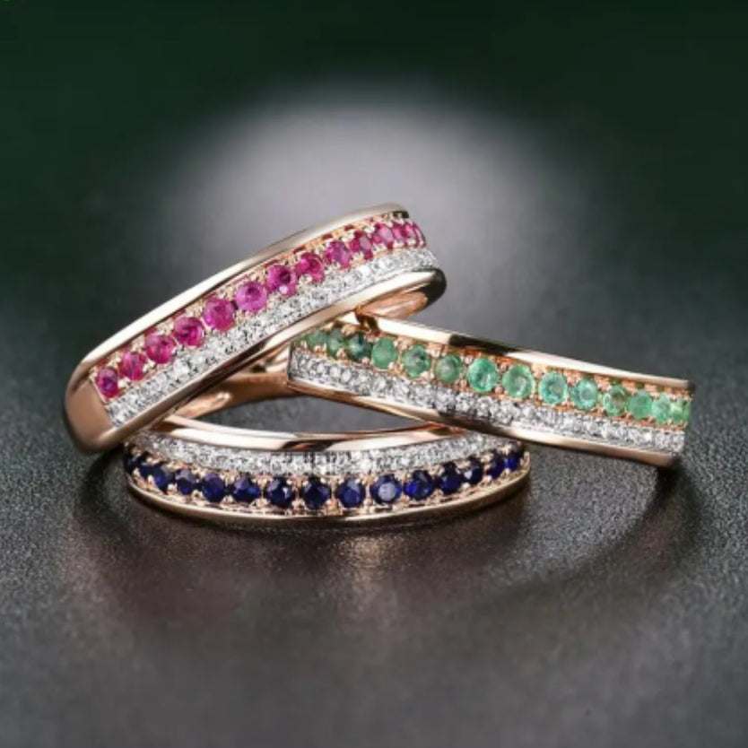 Rose gold diamond and gemstone band rings with sapphires, rubies, and emeralds in pave setting