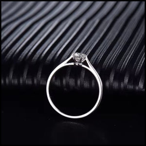 Diamond ring on a textured black background
