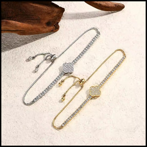 Elegant moissanite tennis bracelets in silver and gold-plated finishes with adjustable chains and sparkling stones