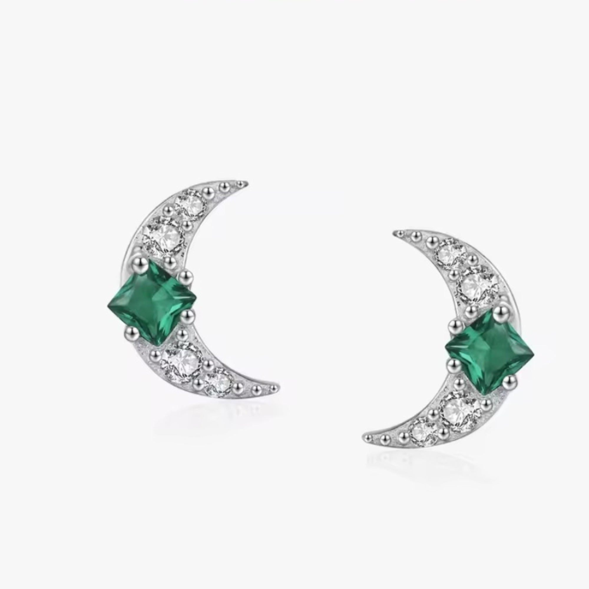 Silver crescent moon earrings with green and white zirconia stones, elegant and sparkling Moon Silver Green Zirconia Earrings.
