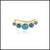 Gold earrings with blue opal stones on a white background