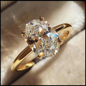 Oval zirconia gold plated silver ring with oval 1CT stone in four-prong setting