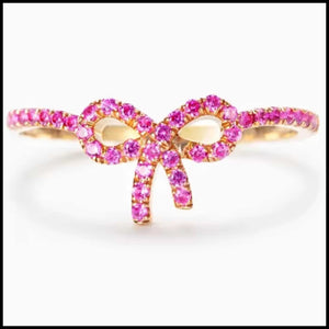 Pink zircon bow ring with 14k gold plating on silver band, minimalist feminine design