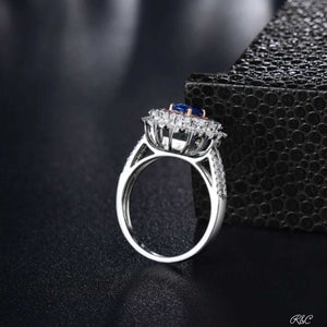 MEGHAN dual design 18K white gold ring with oval blue sapphire and round diamonds luxury jewelry