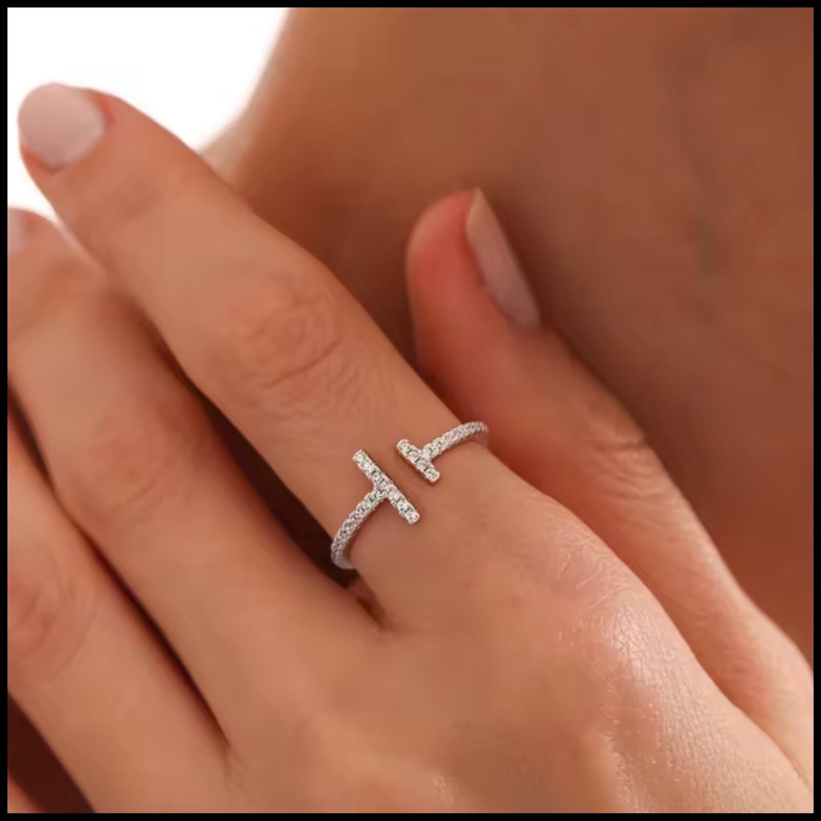 Silver Zircon Adjustable Ring on finger with parallel zircon details sparkling