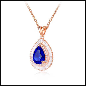 Tanzanite diamond rose gold necklace with 2.3-carat pear-shaped tanzanite and 0.65-carat round diamonds in 18k rose gold setting