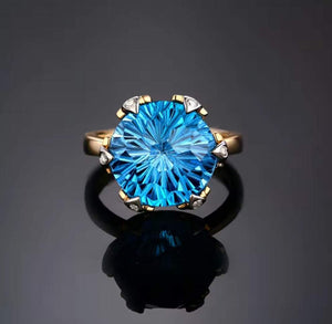 R and C Signature Piece ring with 9.68ct natural blue topaz and diamond accents in 14K white and yellow gold setting