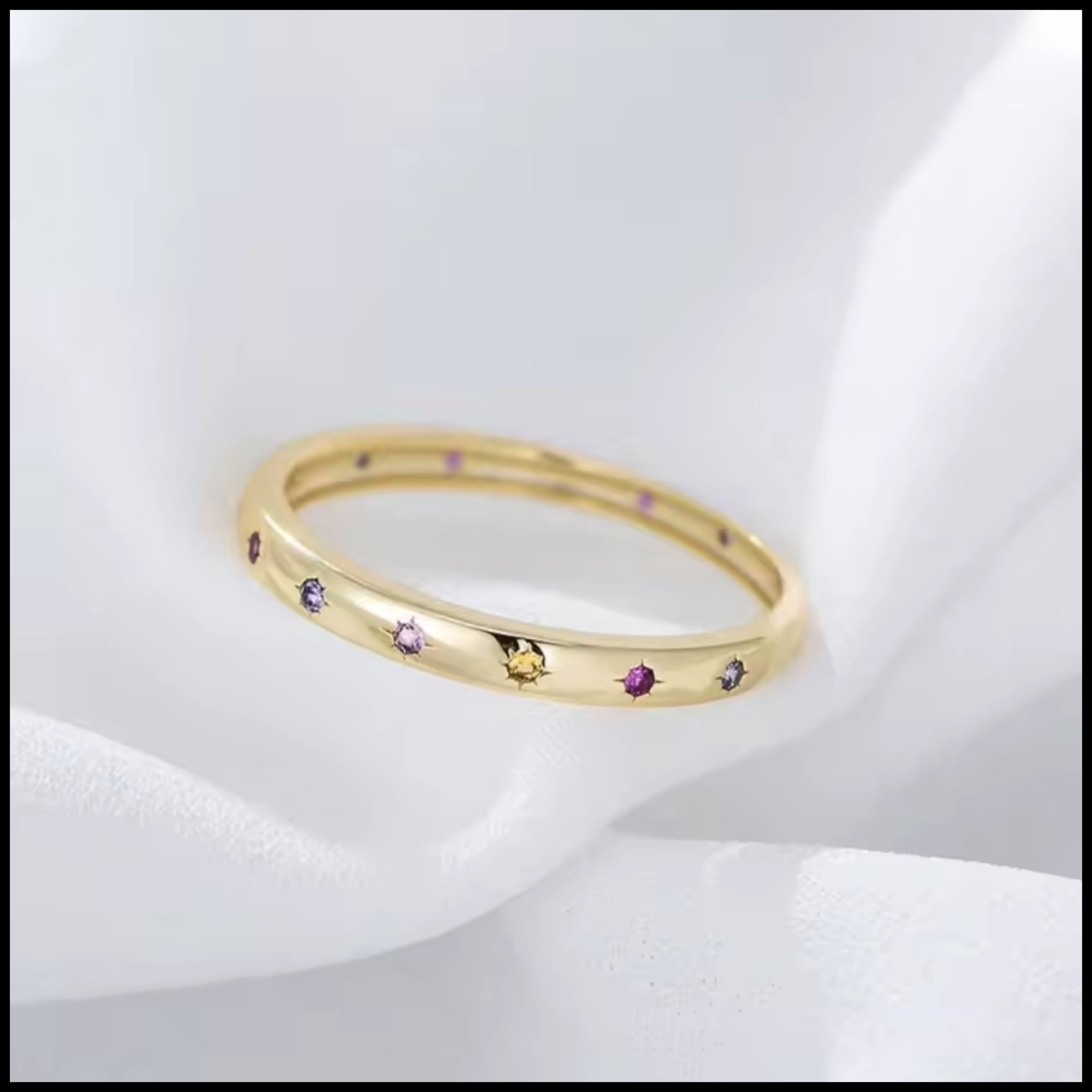R&C Minimalistic Gold Multi-coloured band ring with gold plating and multi-coloured zirconia stars on solid silver band