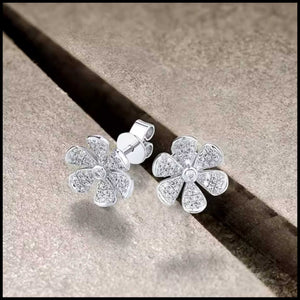 flower diamond earrings.,.
