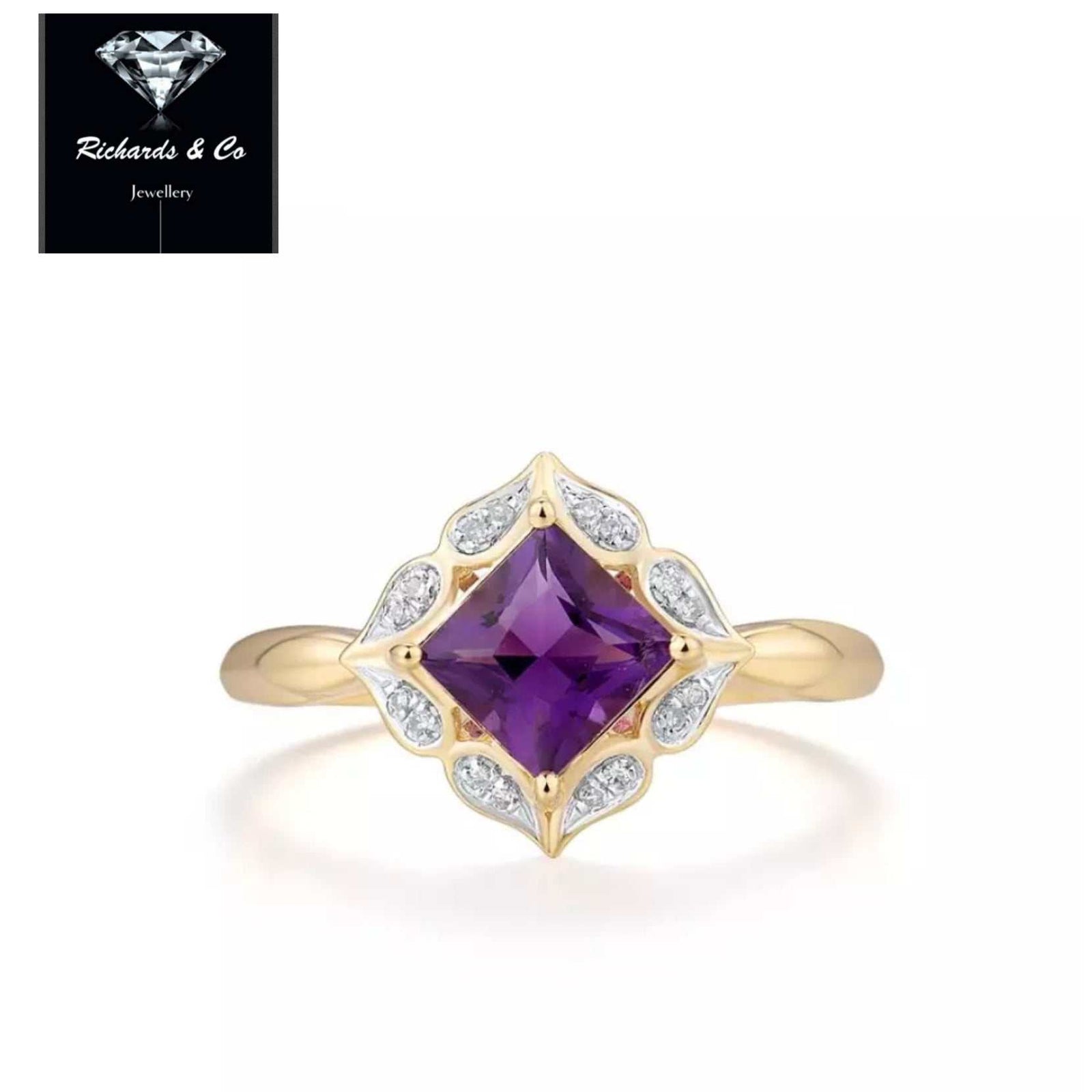 Yellow gold purple amethyst and diamond ring with prong setting and elegant band design