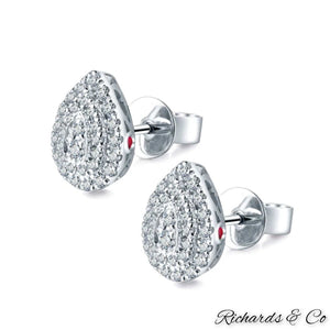 Pair of diamond pear earrings in 14k white gold with pink sapphire accents and 0.332ct natural diamonds