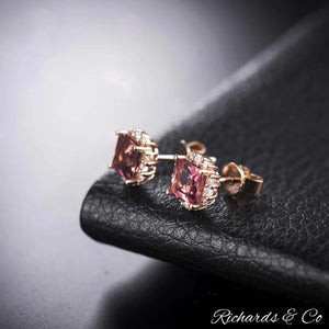 Natural pink tourmaline stud earrings in 18K rose gold with round-cut diamonds