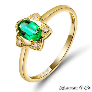 18k yellow gold ring with natural Colombian emerald and diamond star design