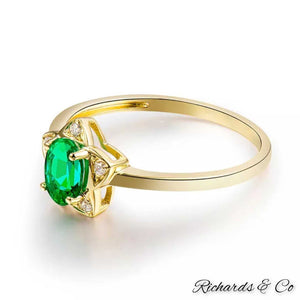 18k yellow gold ring with natural Colombian emerald and diamond star design