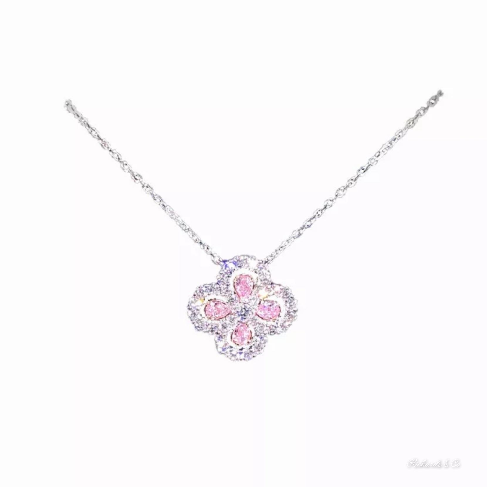 Tiffany Lock Medium Pendant in Rose Gold with Pink Sapphires | Tiffany & Co.
